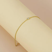 Radiant Dot – Minimalist Gold and Diamond Bracelet