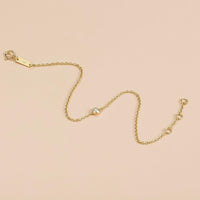 Radiant Dot – Minimalist Gold and Diamond Bracelet