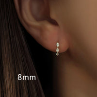 Vela Loop – Marquise Diamond Huggie Earrings