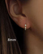 Vela Loop – Marquise Diamond Huggie Earrings