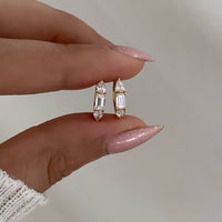 Sora Embrace – Emerald & Pear Cut Huggie Earrings