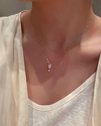 Stellar Drop – Marquise & Round Diamond Pendant Necklace